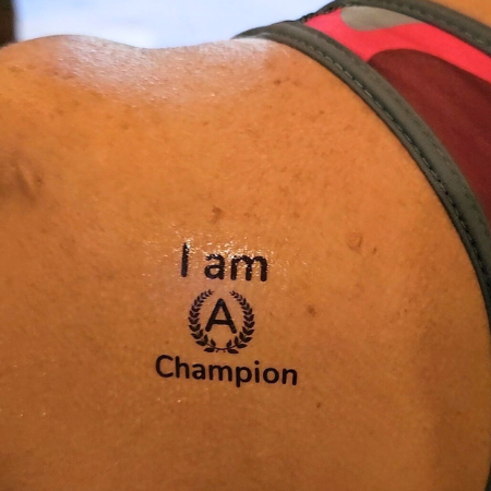 I am A Champion Mantra Tattoo